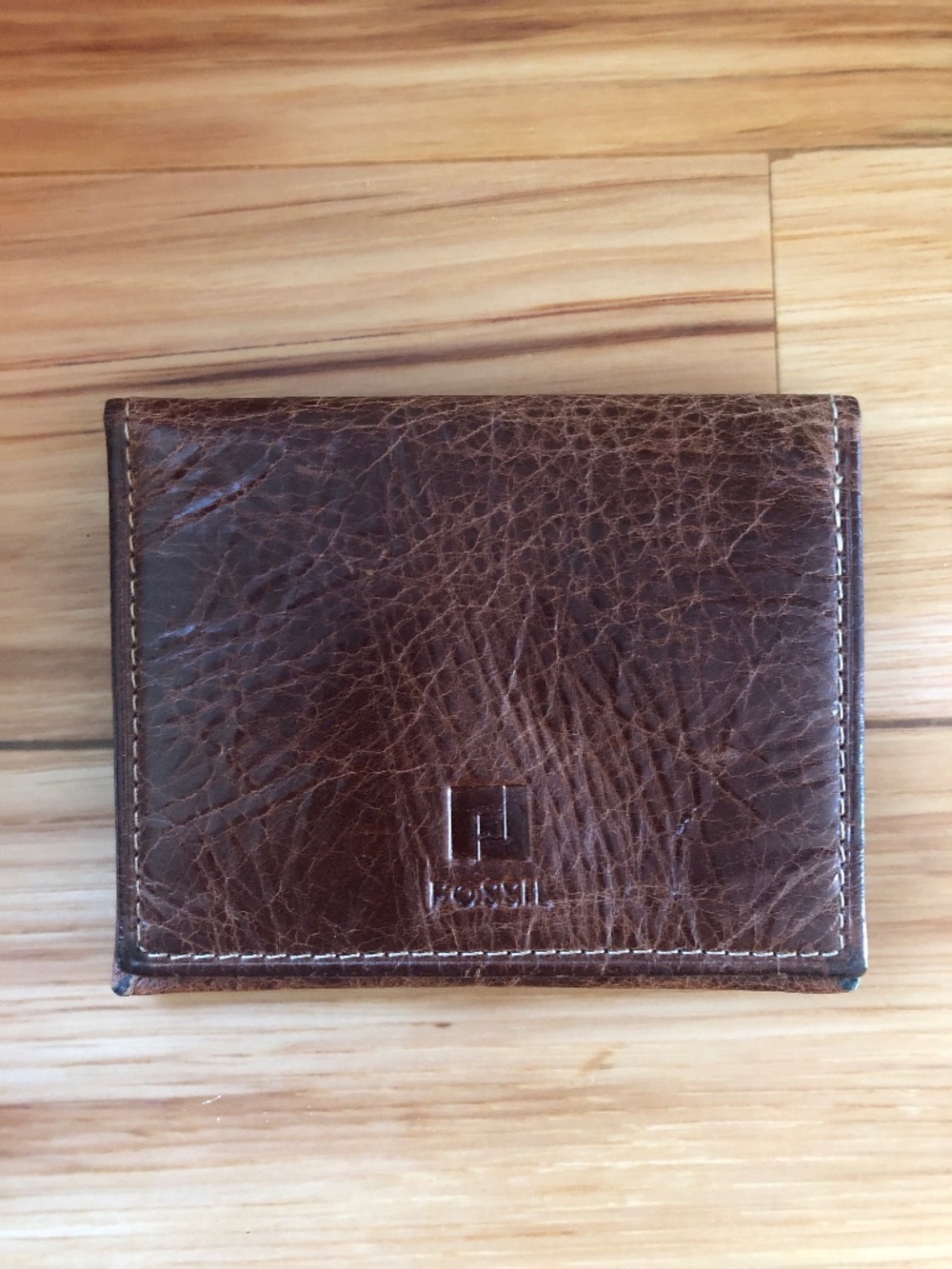 Small Fossil Leather Wallet with Plaid Interior 4x3 Inches
